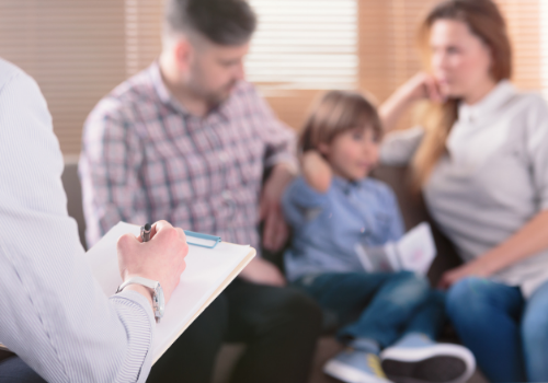 Couple and child sitting together during Family Counseling in Peoria IL