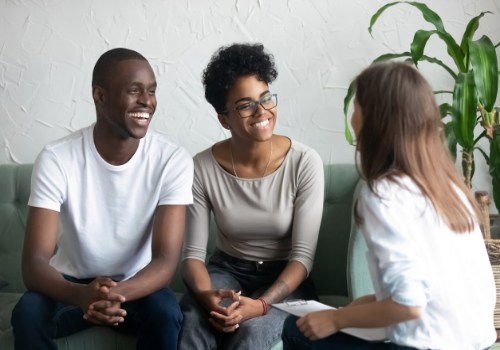 A happy couple having an excellent session of Couples Therapy in Dunlap IL
