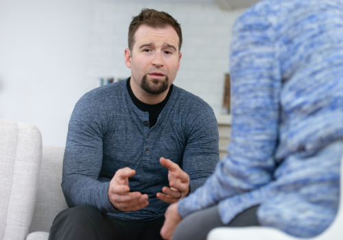 An anxious man talking with a counselor during Anxiety Therapy in Dunlap IL
