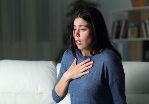 A woman contending with a panic attack
