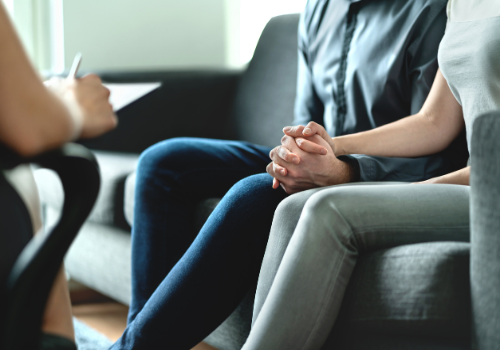 Partners holding hands during Couples Therapy in Peoria IL