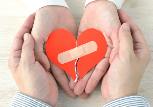 A mended heart with a band-aid, representing a positive outcome in Marriage Counseling in Peoria IL