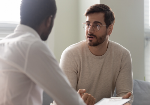 Man discussing issues of depression with Peoria Therapists
