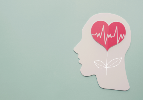 A head with a heart inside it, representing the work of a Therapist in Peoria IL