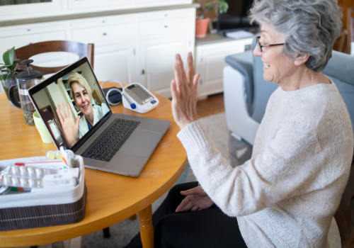 A woman talking with her counselor during Telehealth Therapy in East Peoria IL