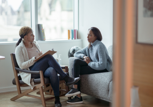 A woman discussing symptoms of depression with Counselors Near You