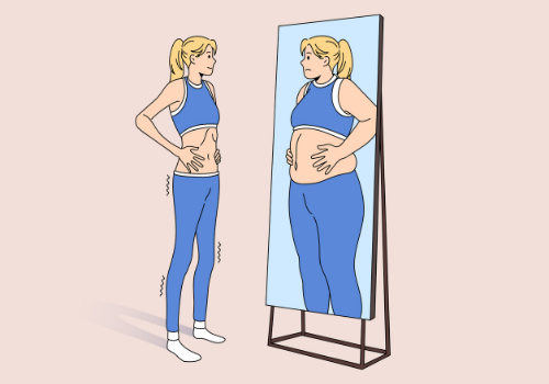 Skinny woman who has Eating Disorders in Peoria IL, looking in a mirror and seeing a larger image of herself