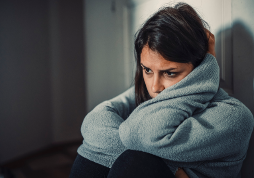 A woman struggling with depression, considering going to Depression Counseling in East Peoria IL