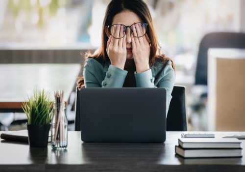 A woman suffering from fatigue and stress and needing Burnout Therapy in Peoria IL