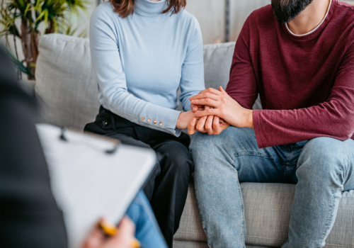 A couple discussing their relationship to Marriage Counselors in Peoria IL