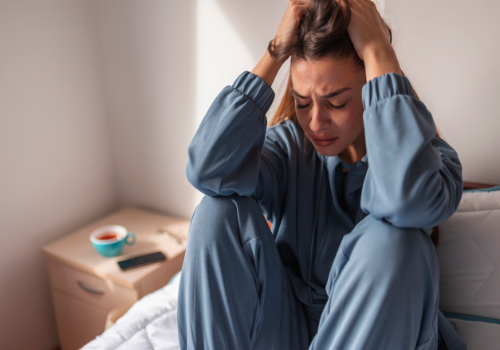 A woman contending with severe anxiety, needing Anxiety Therapy in Washington IL