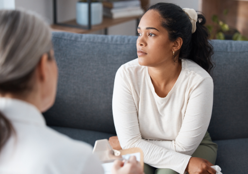 A client sitting with a counselor, discussing their Sexuality in Peoria IL