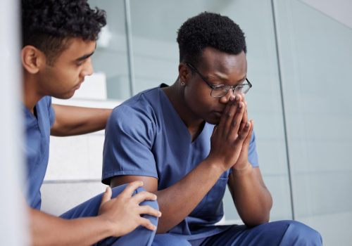 A man suffering from fatigue due to work and needing Burnout Counseling in Peoria IL