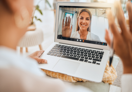 A woman talking on a computer with Marriage Counselors in Washington IL