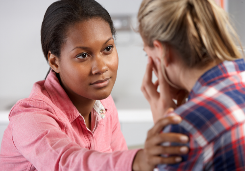 A counselor comforting a client during Depression Treatment in East Peoria IL