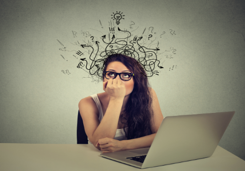 A woman struggling to focus, needing ADHD Treatment in Peoria IL