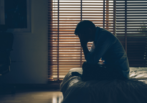 A man dealing with depression when waking up, needing Depression Counseling in Peoria IL