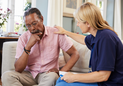 A counselor reassuring a client during Depression Treatment in Peoria IL