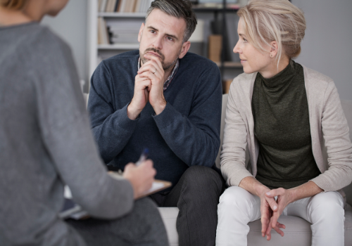 A married couple talking with a counselor during Marriage Counseling in East Peoria IL