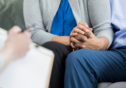 Couple holding hands during Couples Therapy Near You