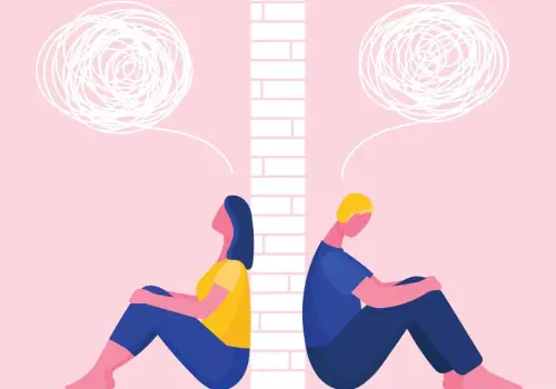 An illustration of an unhappy couple on opposite sides of a wall needing Relationship Counseling in Dunlap IL