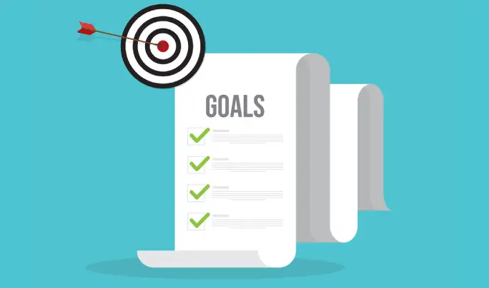 A list of goals with a bullseye and target, representing the work that can be achieved through life coaching and personal coaching in Peoria, IL