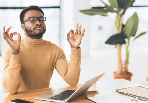A man implementing breathing exercises to Calm Anxiety