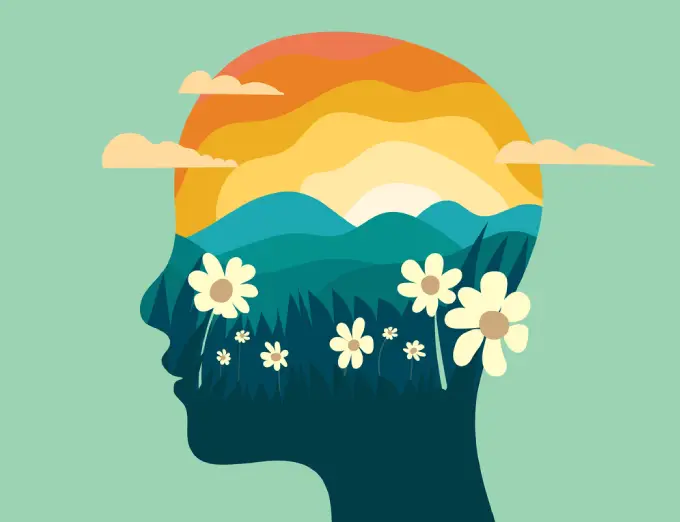 An illustration of a head with the inside being a beautiful sunrise with mountains and a field of flowers, representing how the mind feels after the Healing Arts & Brain Spa for holistic mental health treatment, run by Chapin & Russell Associates